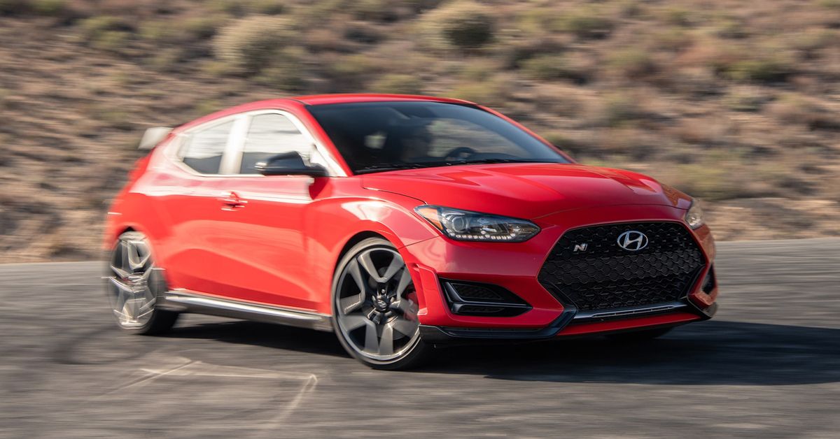 Red 2021 Hyundai Veloster N 2-Door Hot Hatch on the road