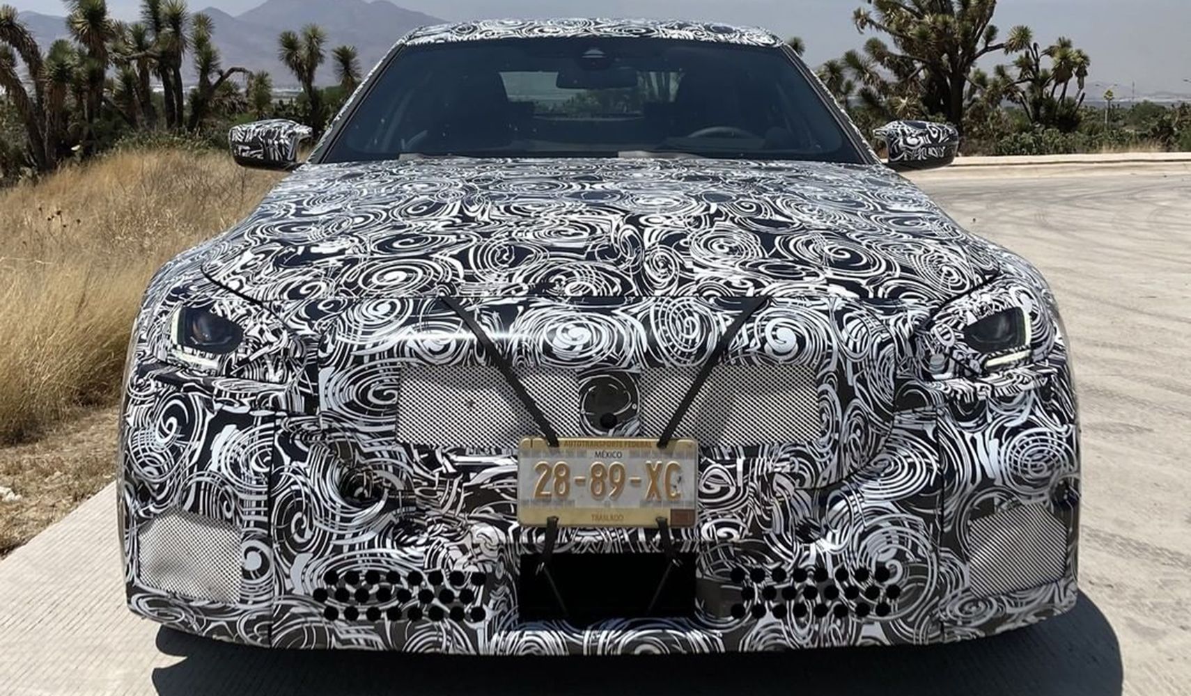 BMW M2 G87 prototype, front view, camouflaged