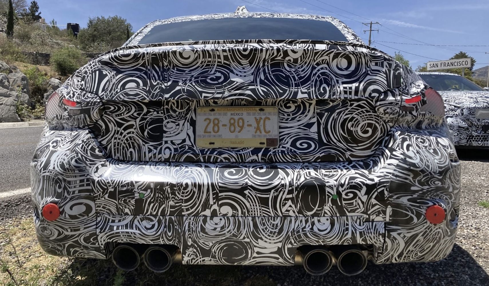 BMW M2 prototype, rear, in camouflage
