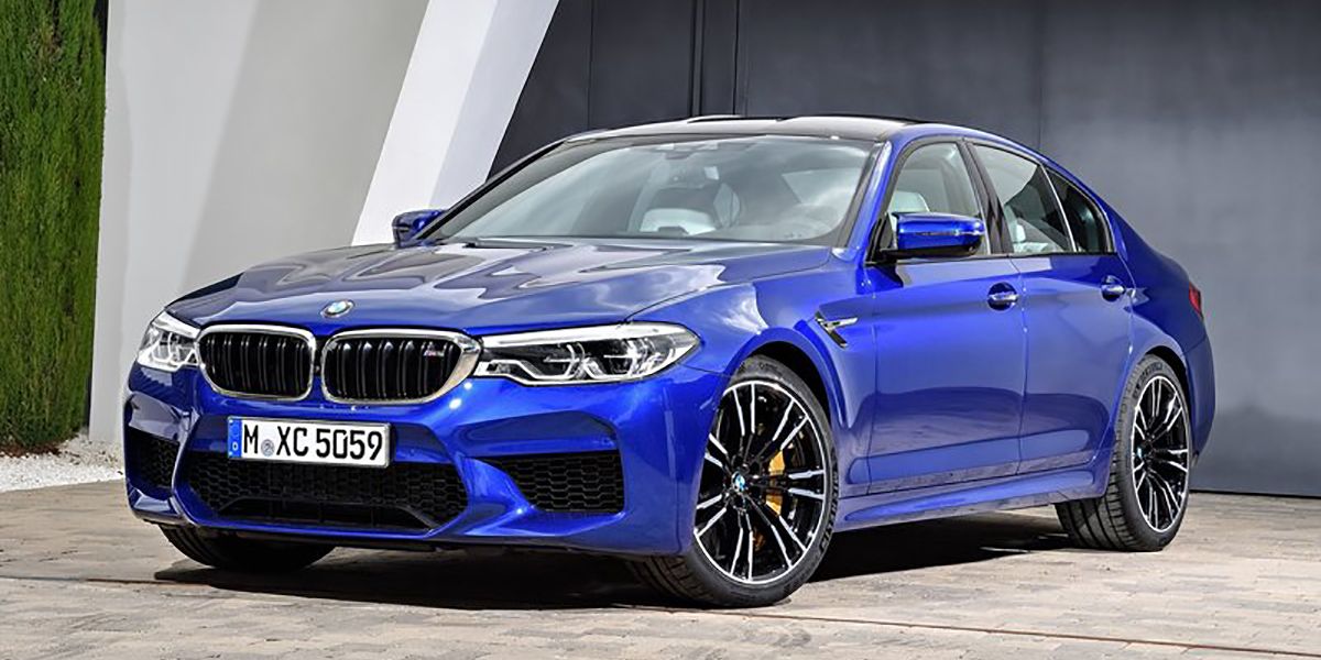 Blue 2018 BMW M5 on display outdoors