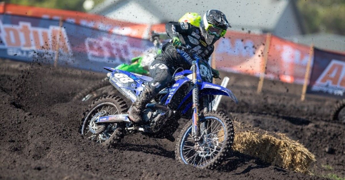 Yamaha motocross bike ripping it out on a dirt track