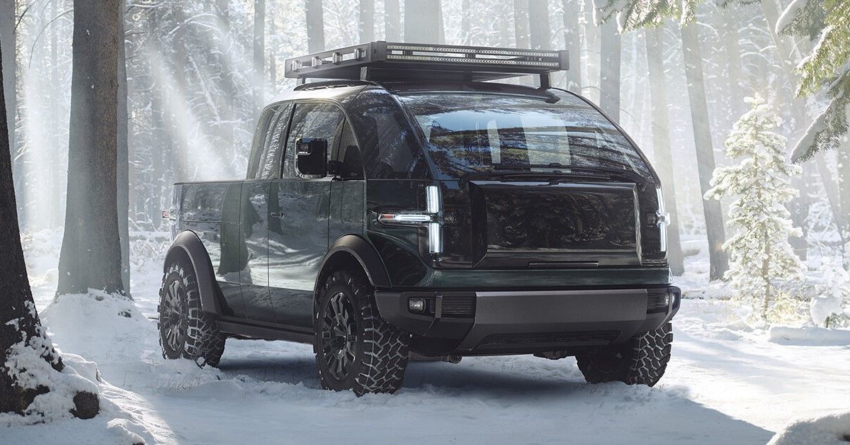 The Canoo pickup truck on snow.