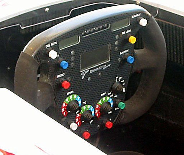 Formula 1 Steering Wheel Via wikimedia Commons:Interiot SamH