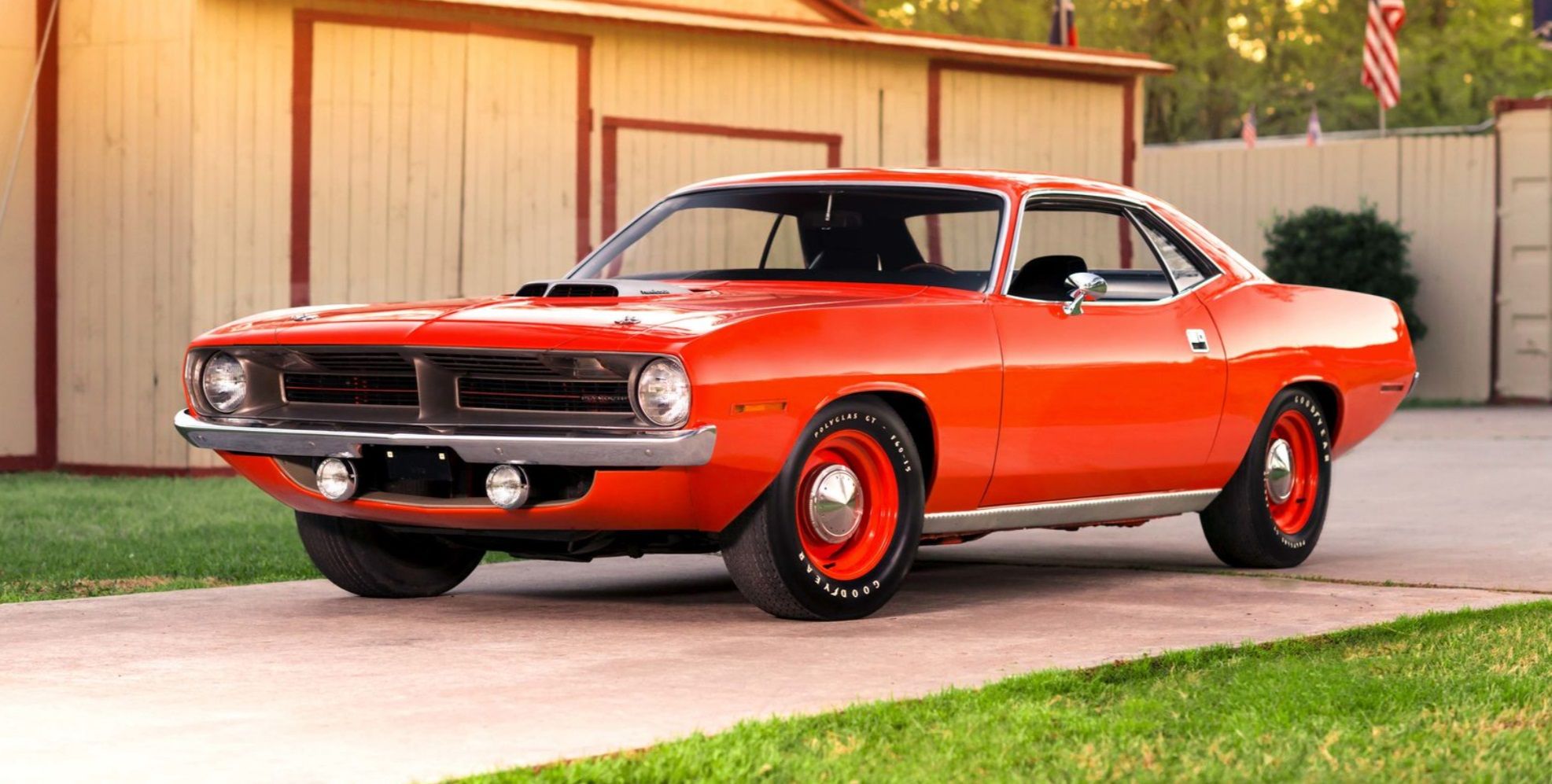 The 1970 Plymouth Hemi 'Cuda parked on a driveway.