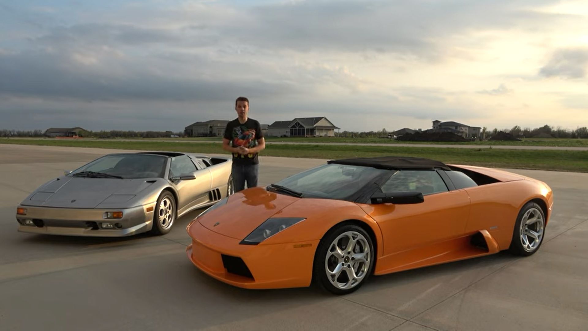 Lamborghini Diablo, silver, and Murcielago, orange, together on runway