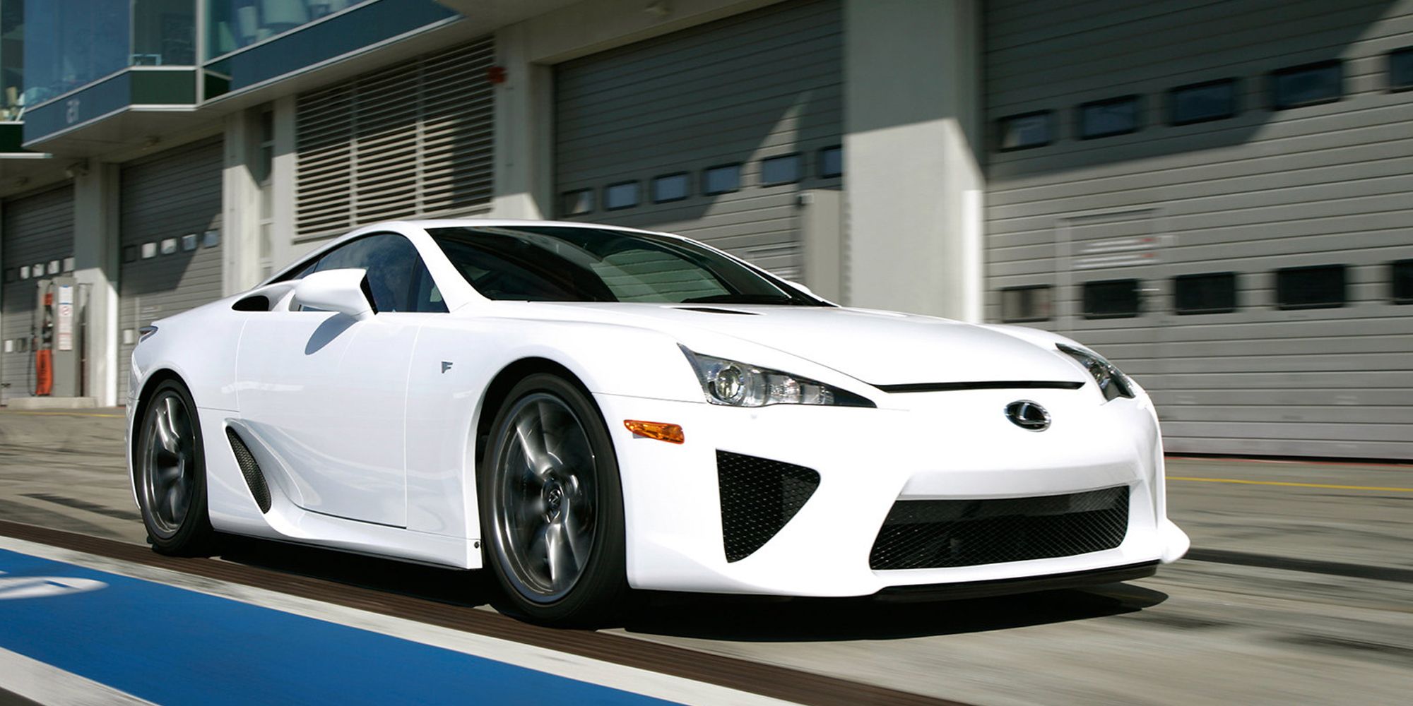 Front 3/4 view of a white LFA on the move in the pitlane