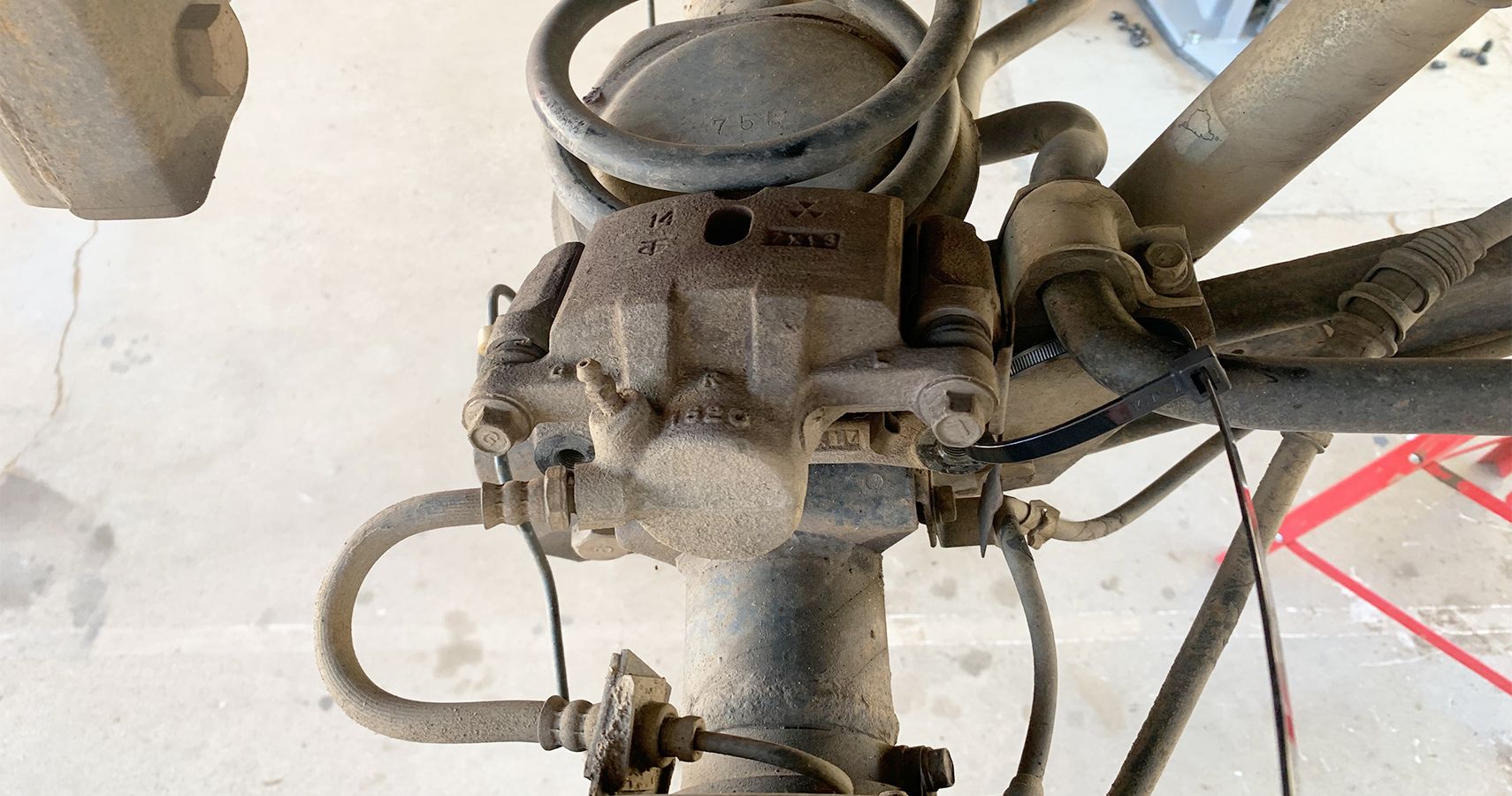 DIY How To Replace Rear Brake Pads And Discs On A 1998 Mitsubishi Montero