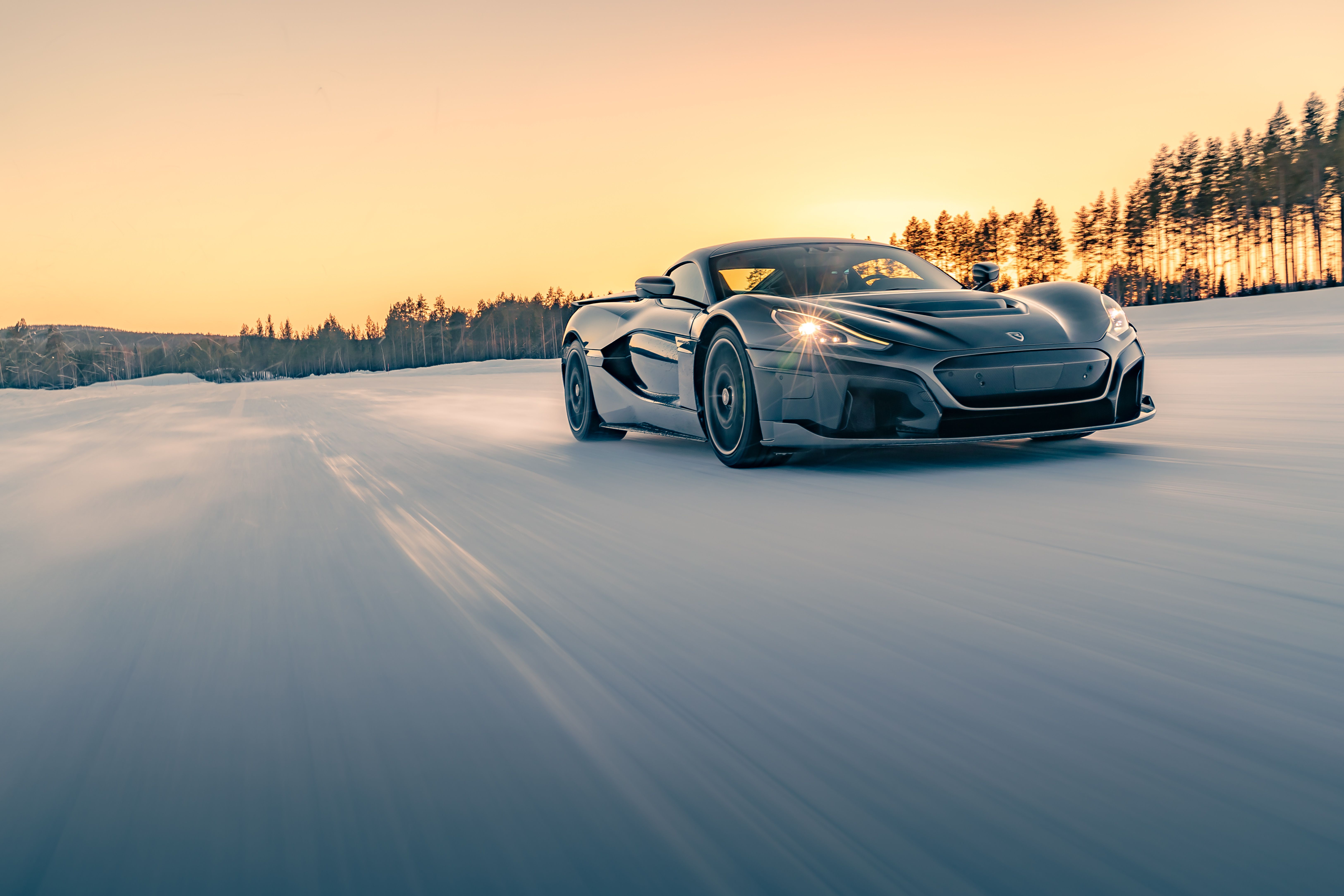 Rimac - Nevera Cold Weather Testing - Sweden - Front Quarter View In Sunset