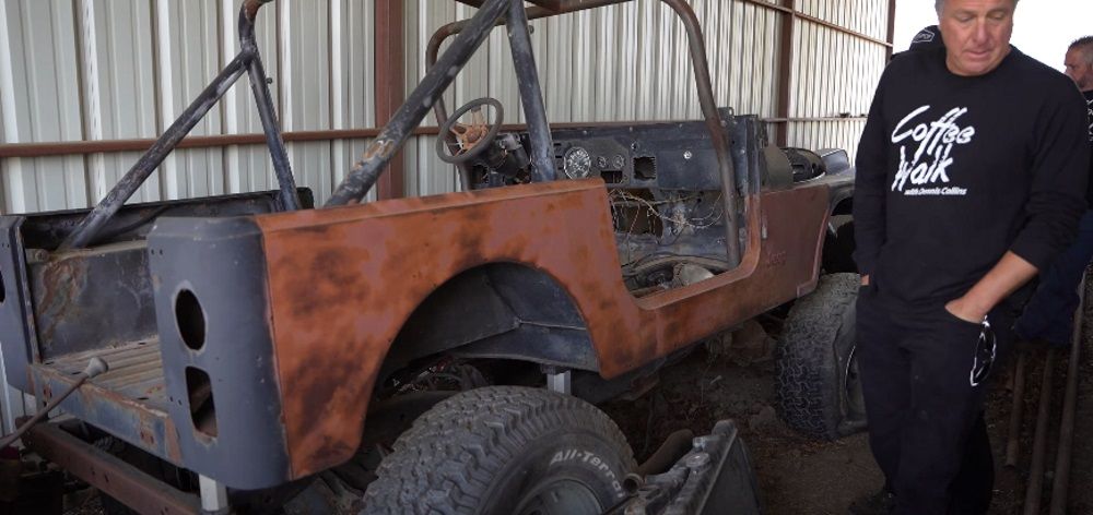 Jeep Lardeo project,rusty, rear quarter view with Dennis Collins
