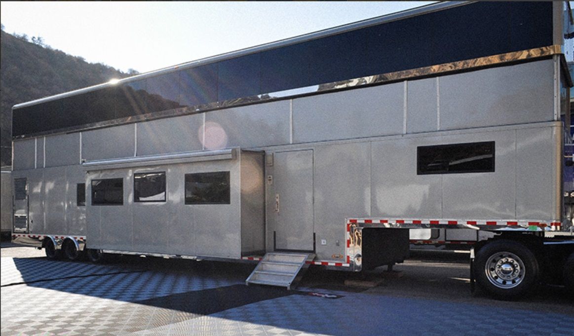 Mariah Carey's 2-Story RV on a parking lot. 