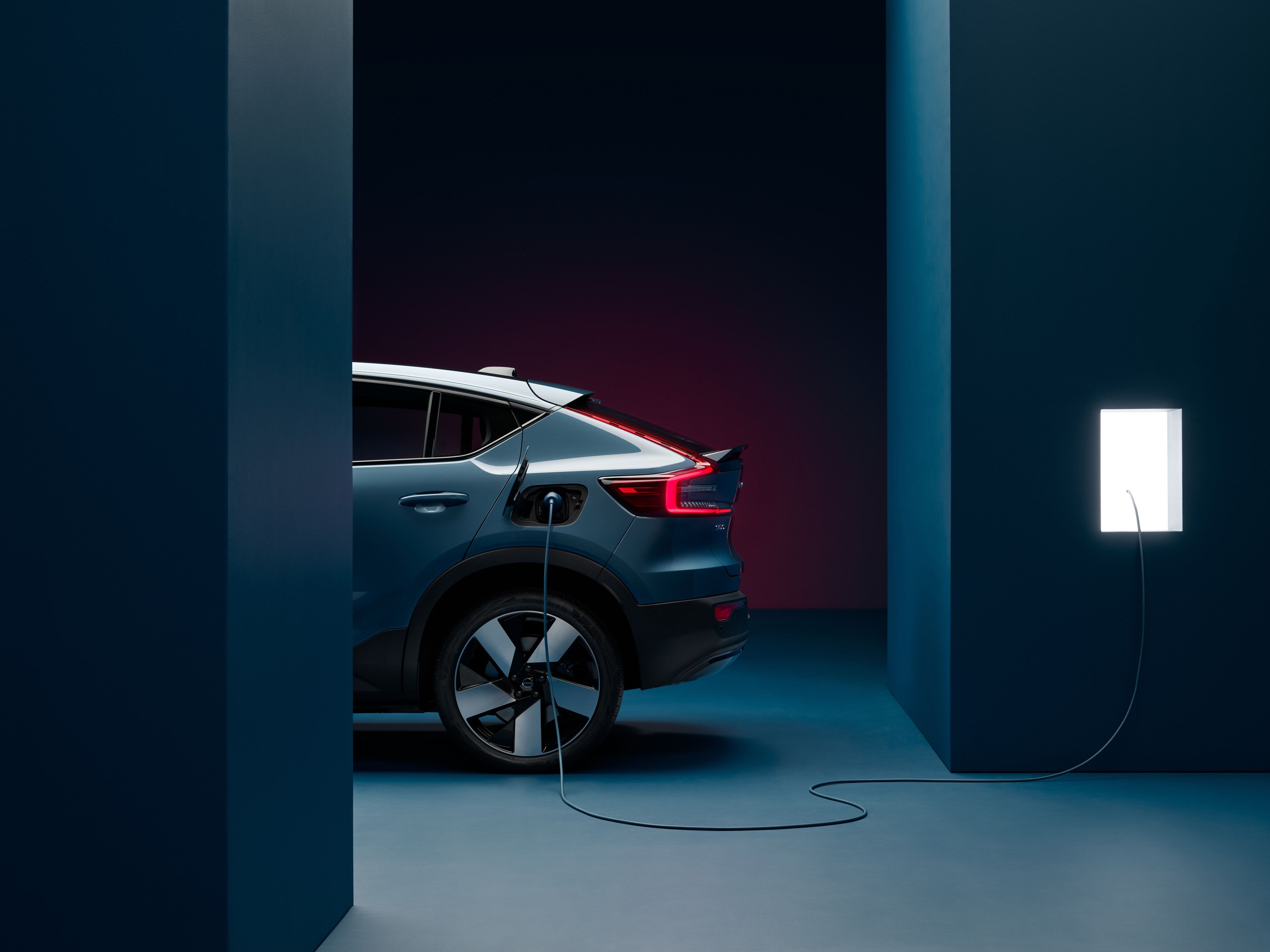 2022 Volvo C40 in blue charging press photo