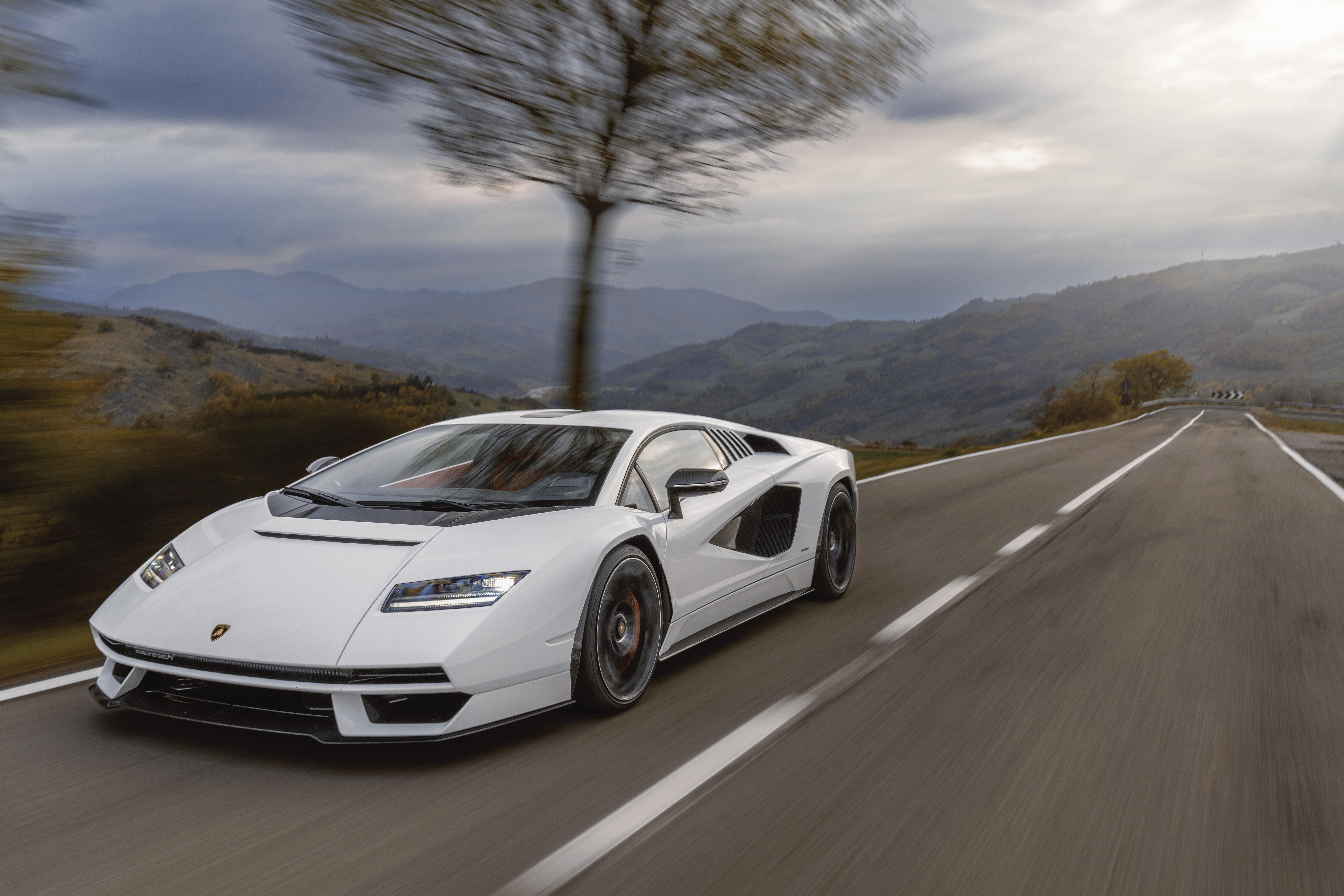 The new Lamborghini Countach LPI 800-4 speeds up on the road. 