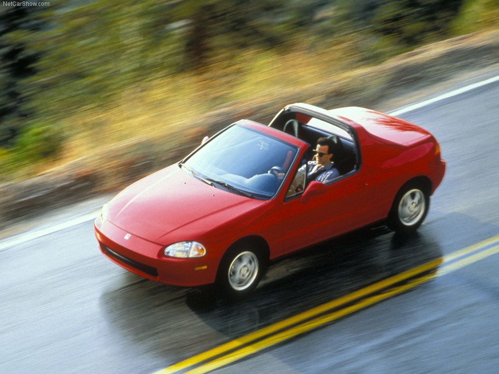 Honda Civic Del Sol driving on the backroads ariel view