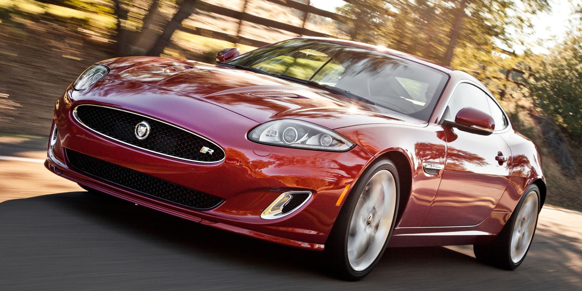 Front 3/4 view of a red XKR on the move
