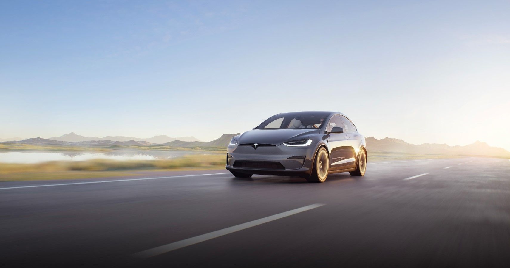 2022 Tesla Model X Plaid front third quarter view on the highway