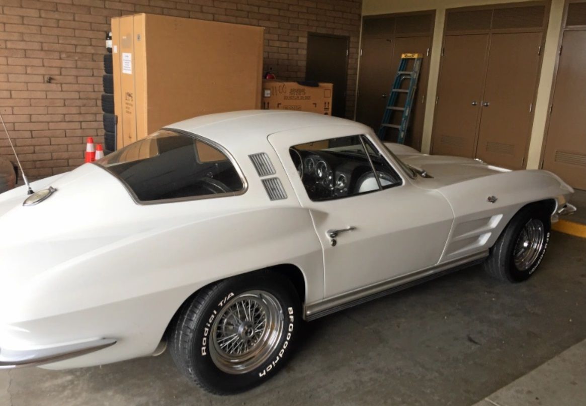 The stolen 1964 Chevrolet Corvette Stingray in a garage.