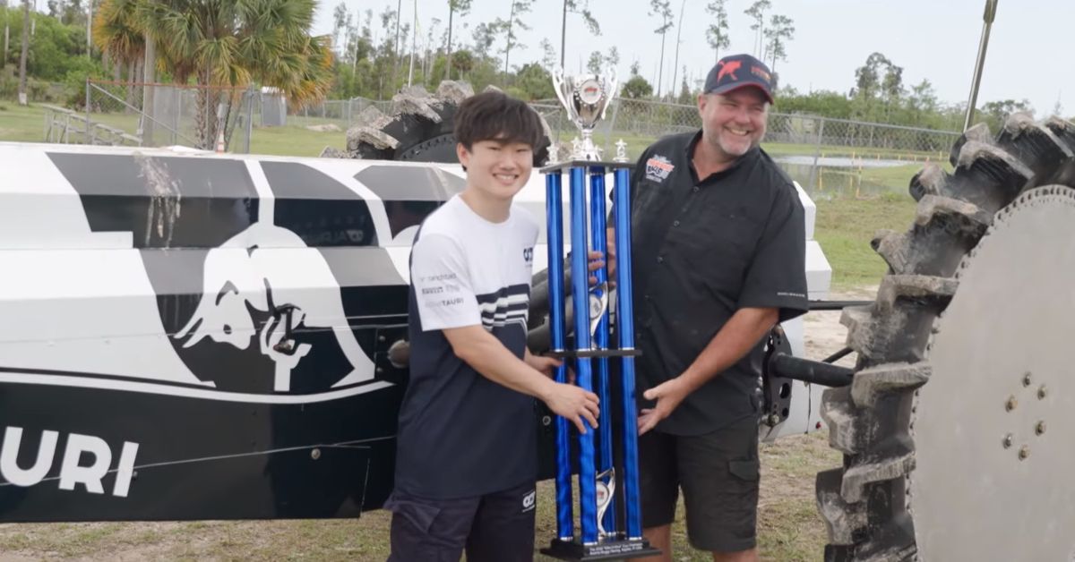 Red Bull YouTube Channel Swamp Buggy champion Yuki Tsunoda with trophy