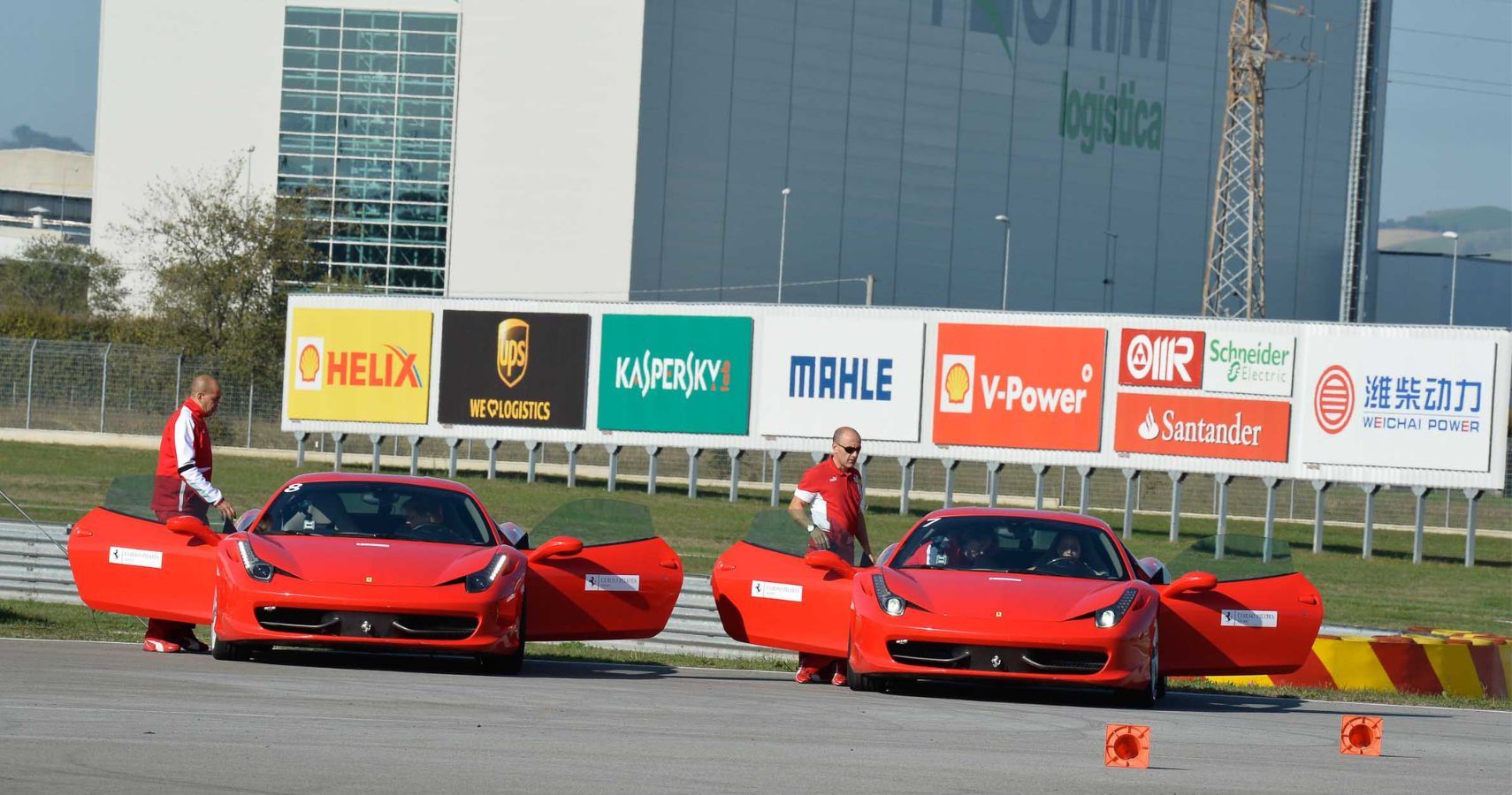 My wife and I in separate Ferrari 458’s