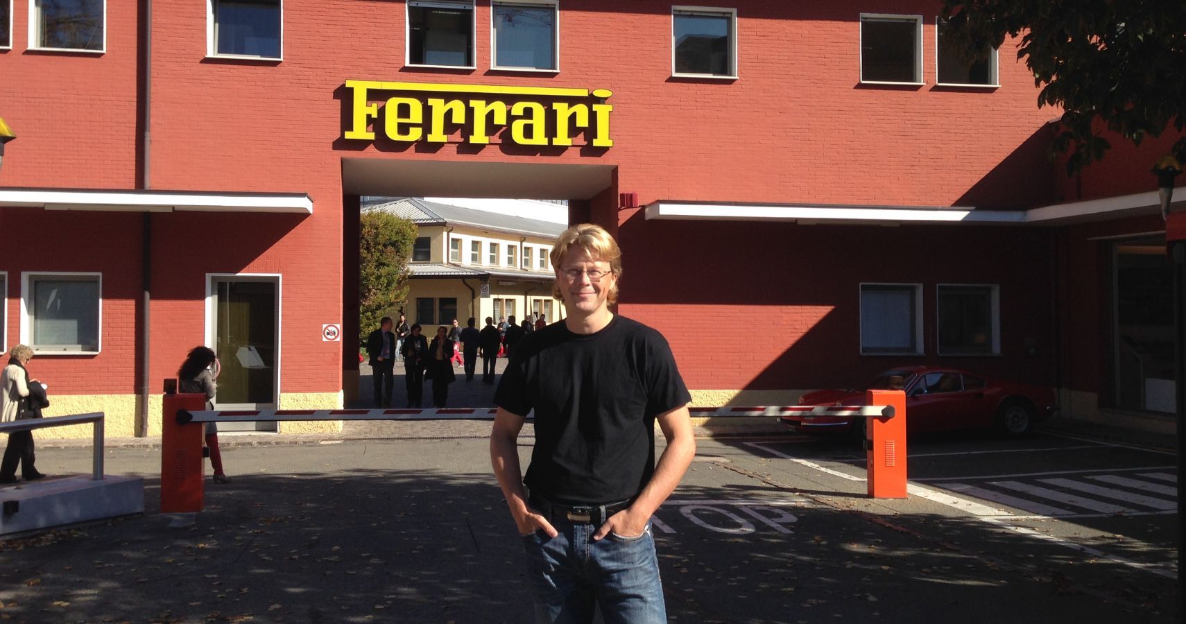 Jason Grunsell standing in front of the old Ferrari gate