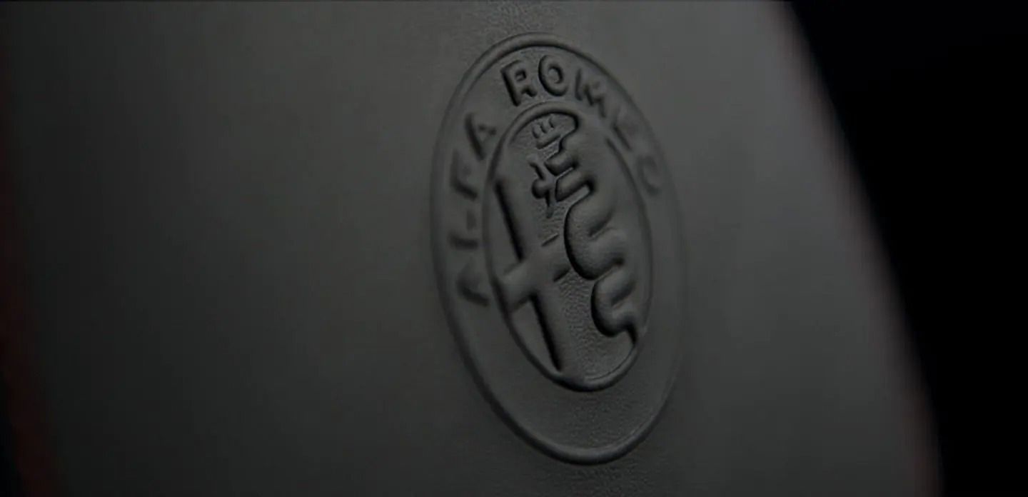 Alfa Romeo Giulia Speciale upholstery badge close-up view