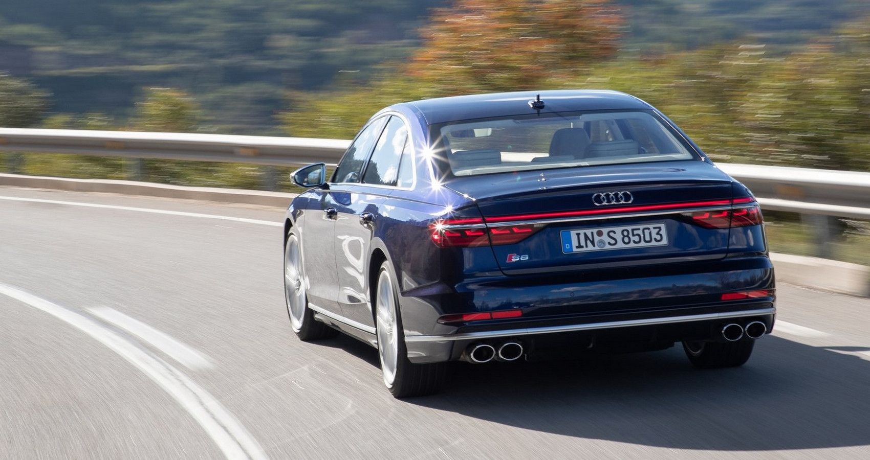 Blue Audi S8 on the road