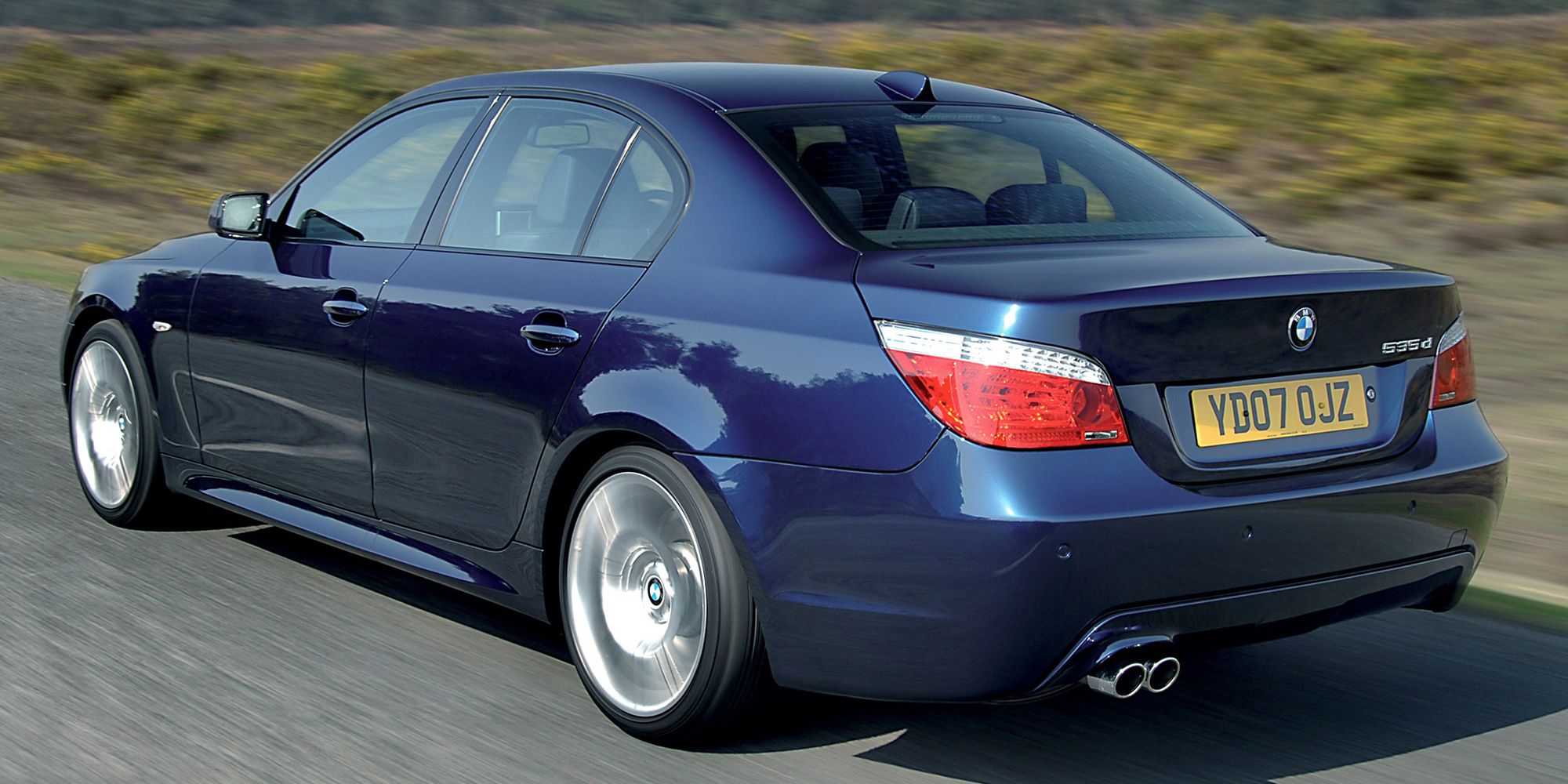 Rear 3/4 view of a dark blue 535d