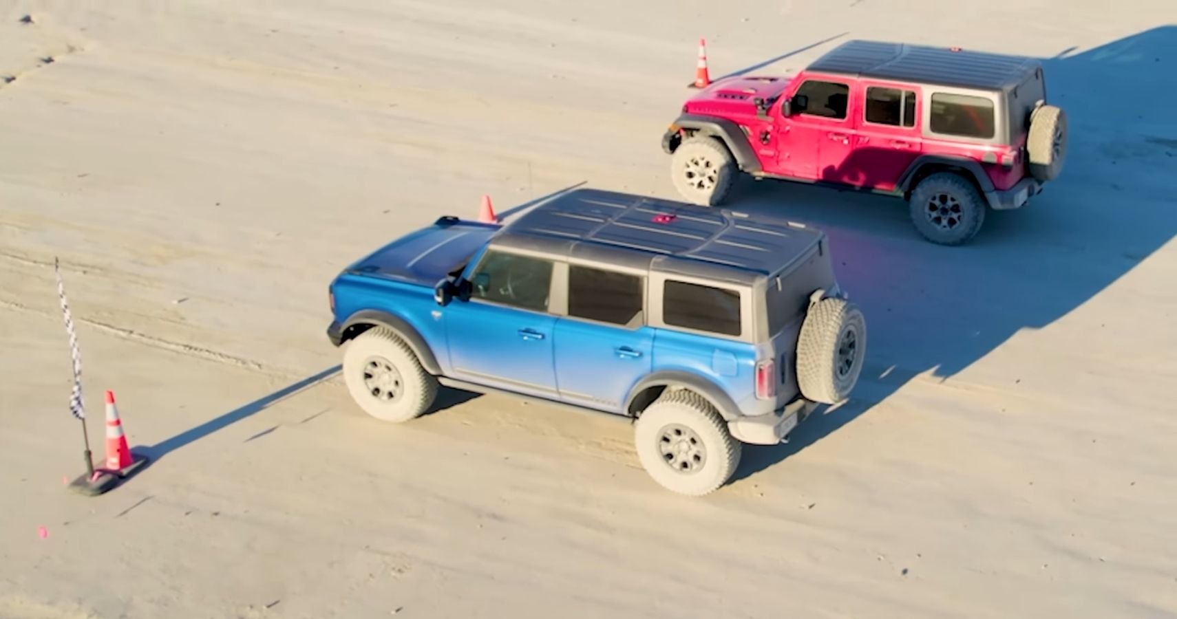 Watch The Ford Bronco And Jeep Wrangler Drag Race In The Dirt