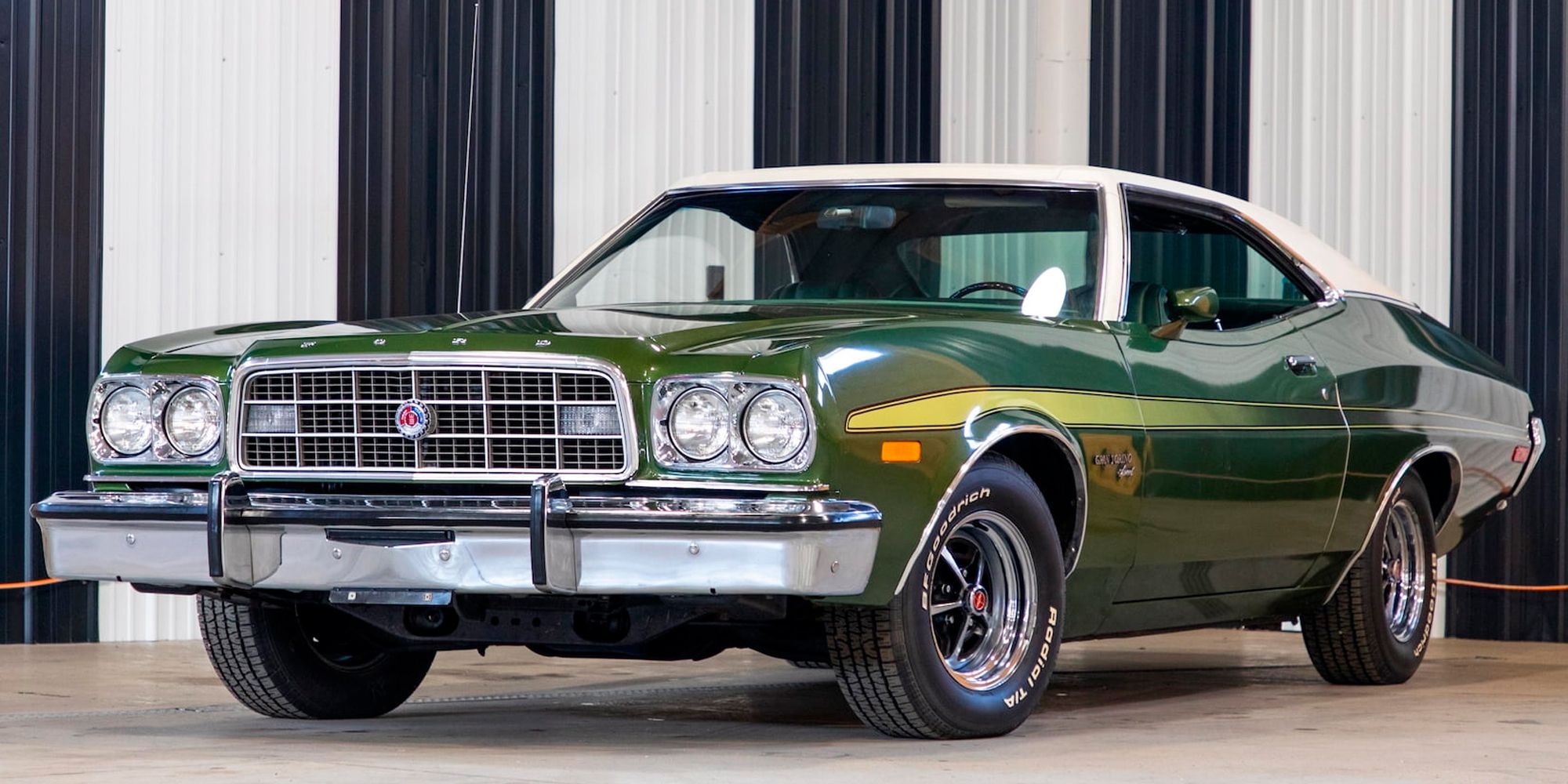 Front 3/4 view of a green 1973 Gran Torino