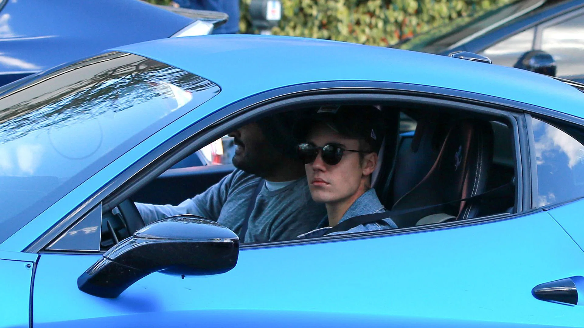 Justin Bieber in his Customized Ferrari 