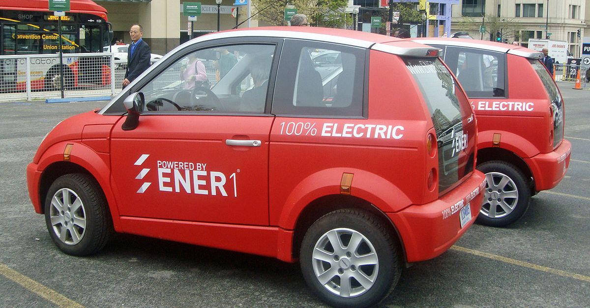 Red Think City  Electric Car - Rear Left Angle