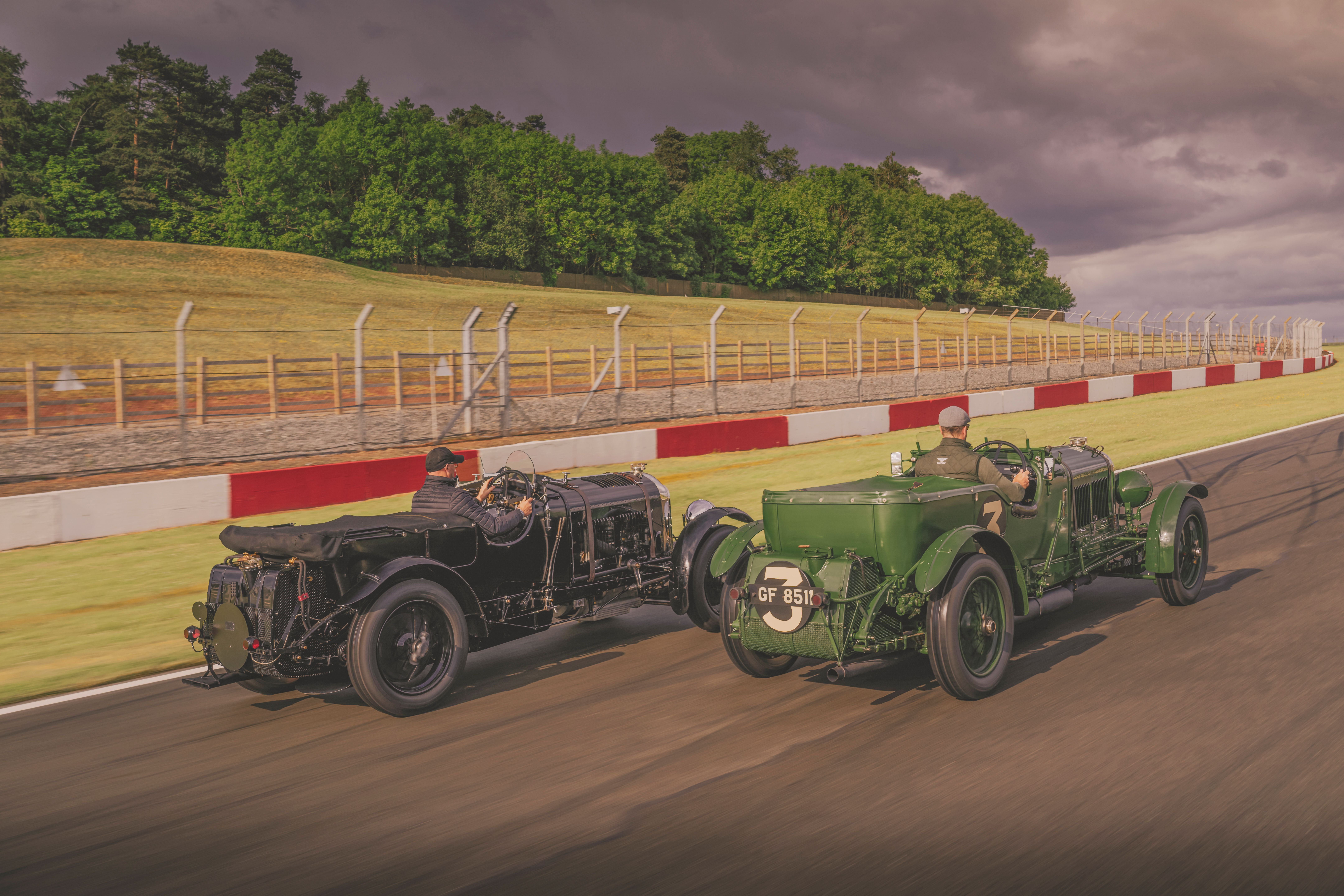 Bentley Speed Six Continuation Series, two cars on track, rear quarter view