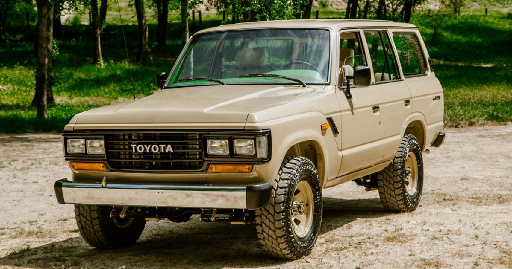 beige restored 1990 Toyota Land Cruiser FJ62