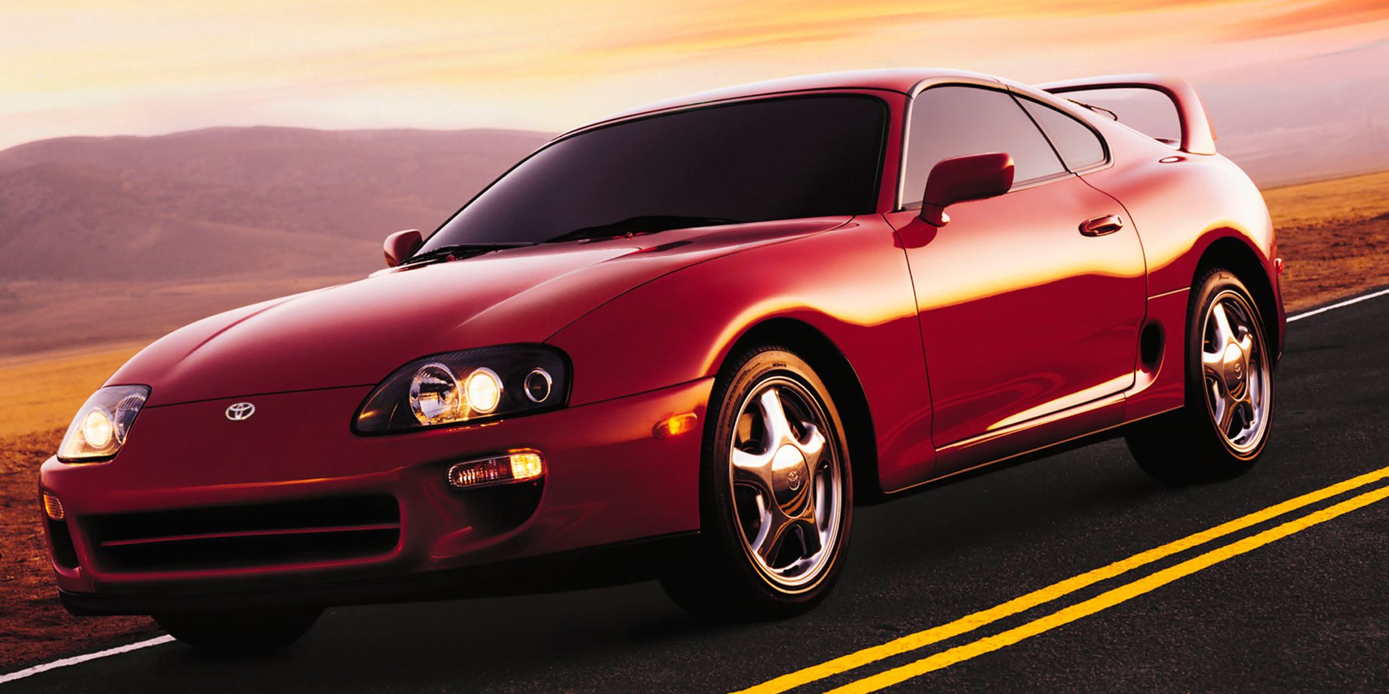 Front 3/4 view of a red Mk4 Supra