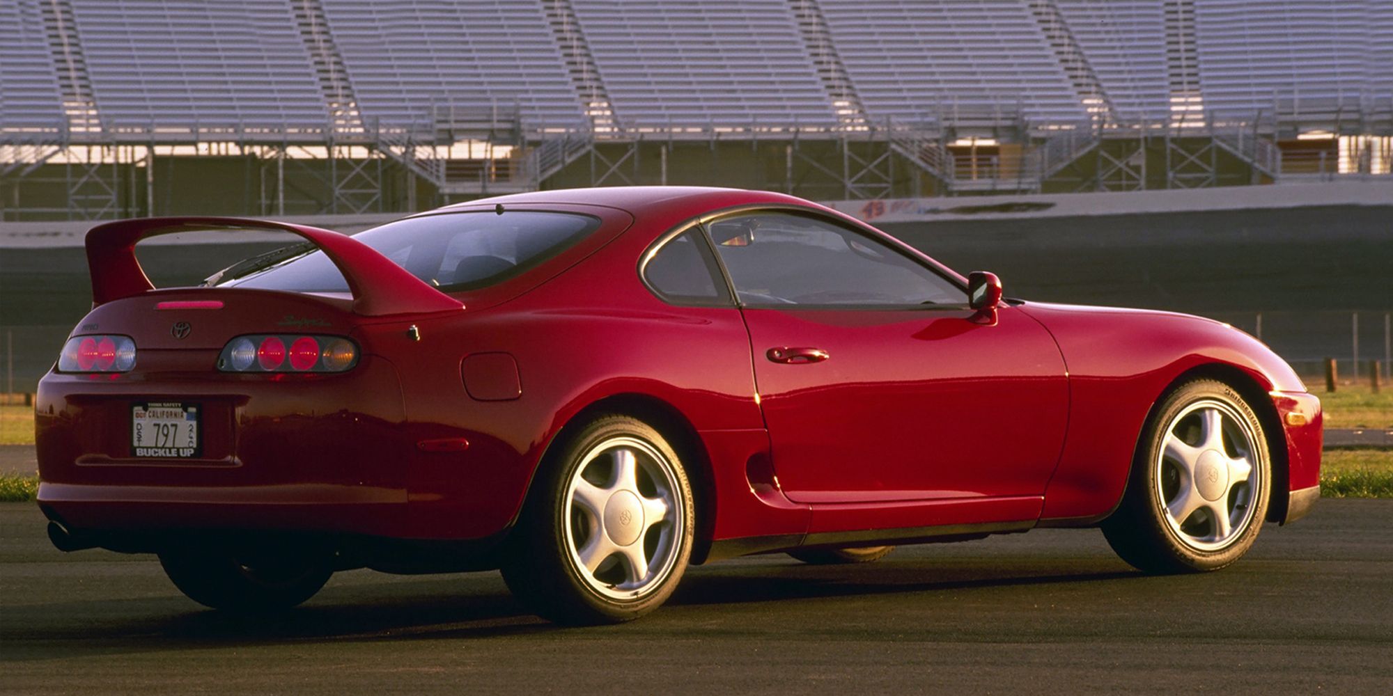 Rear 3/4 view of a red Mk4 Supra