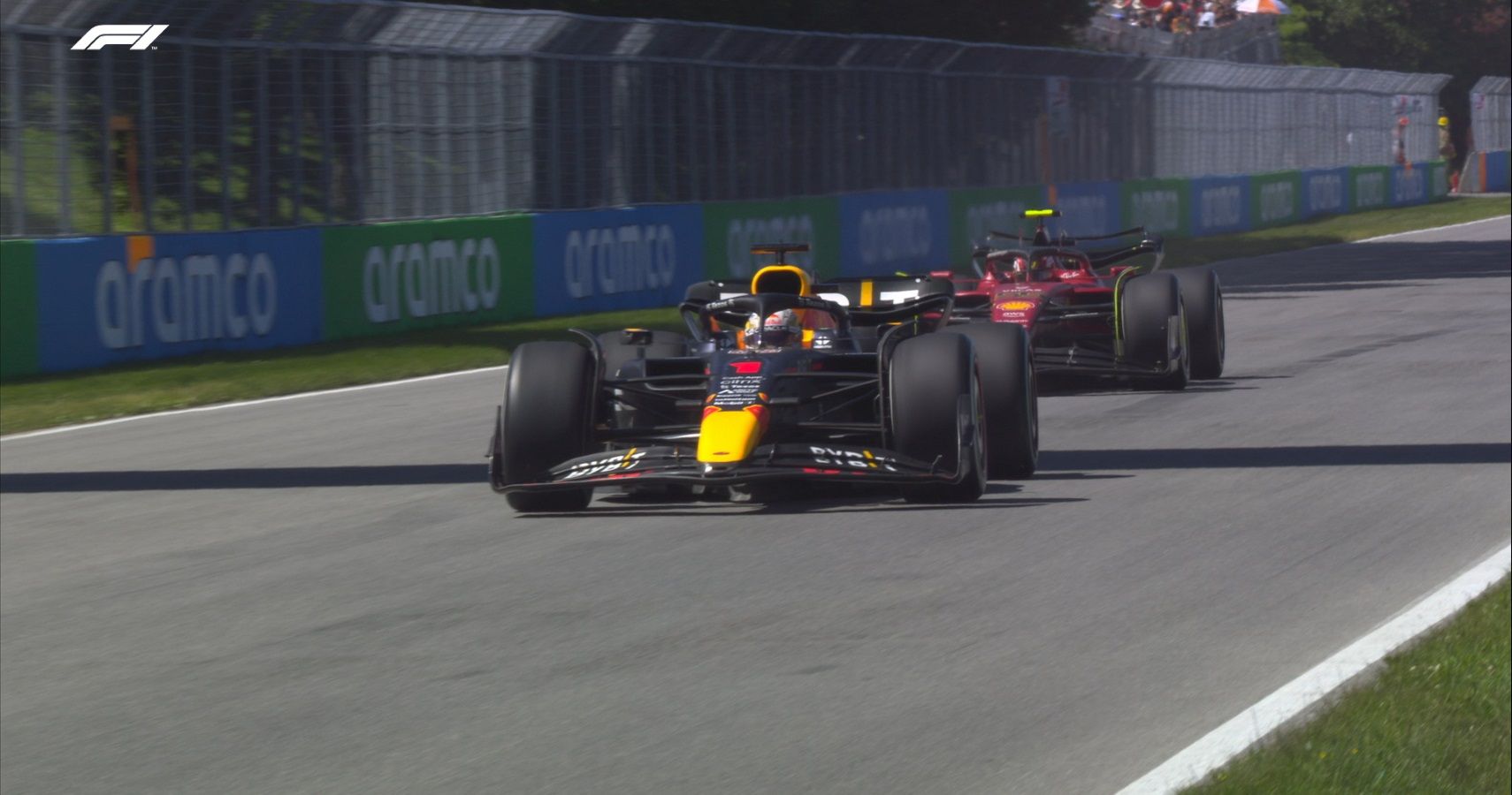 Verstappen vs. Sainz Formula 1, front quarter view of F1 cars on track
