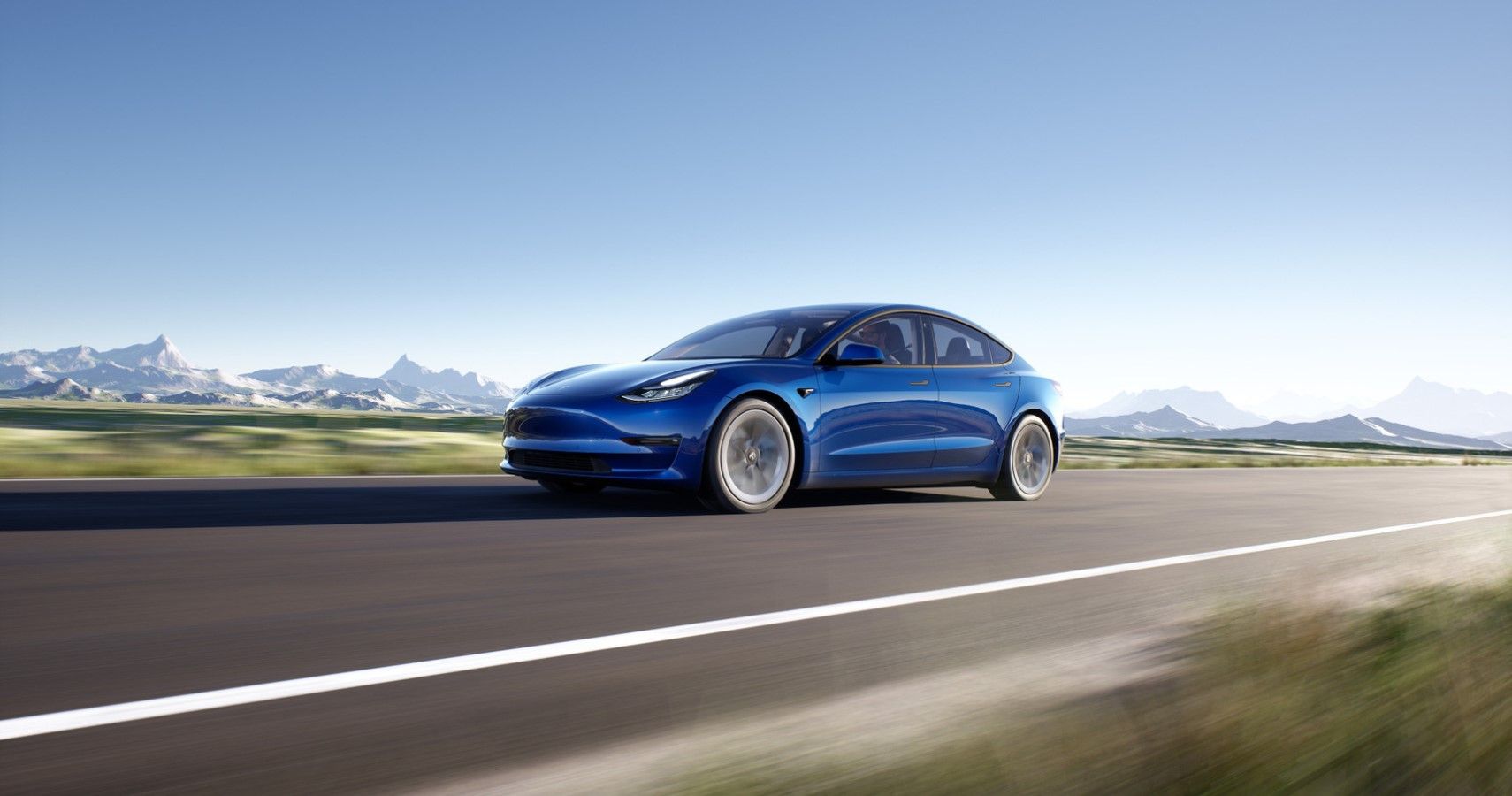 2022 Tesla Model 3 front third quarter accelerating view