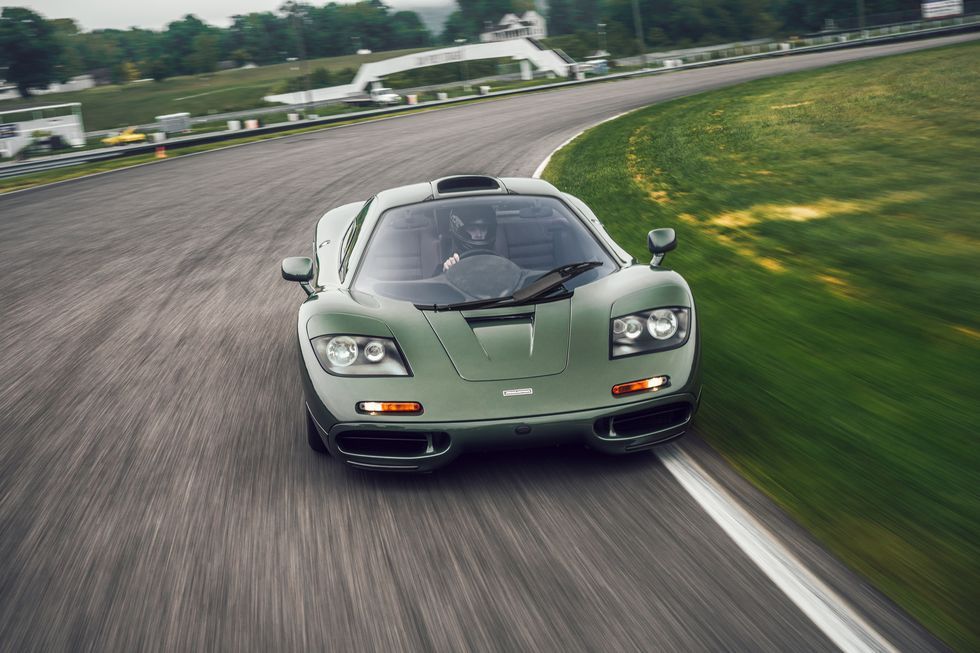 A 1995 McLaren F1 on a racetrack.