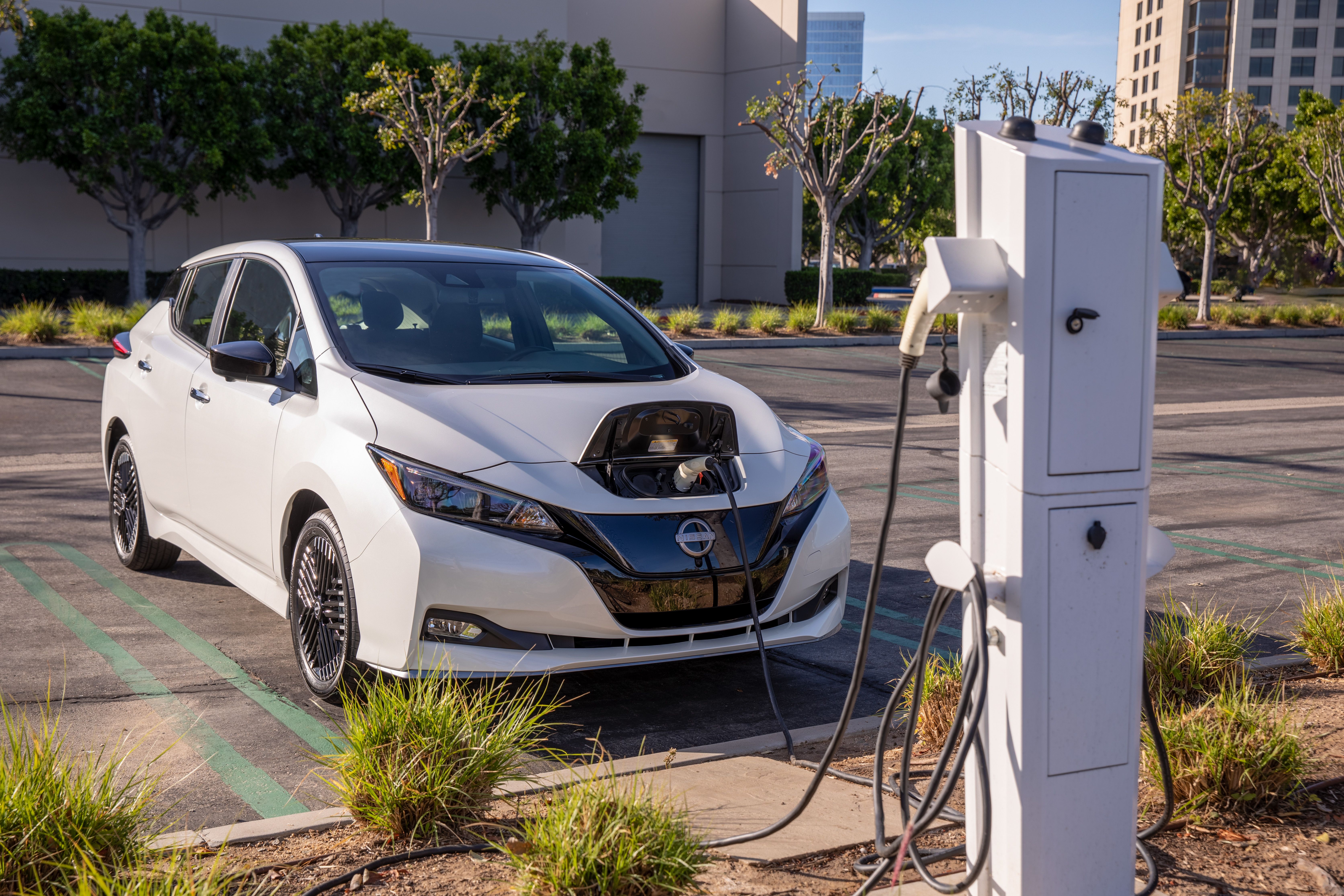 The 2023 Nissan Leaf charges outdoors. 