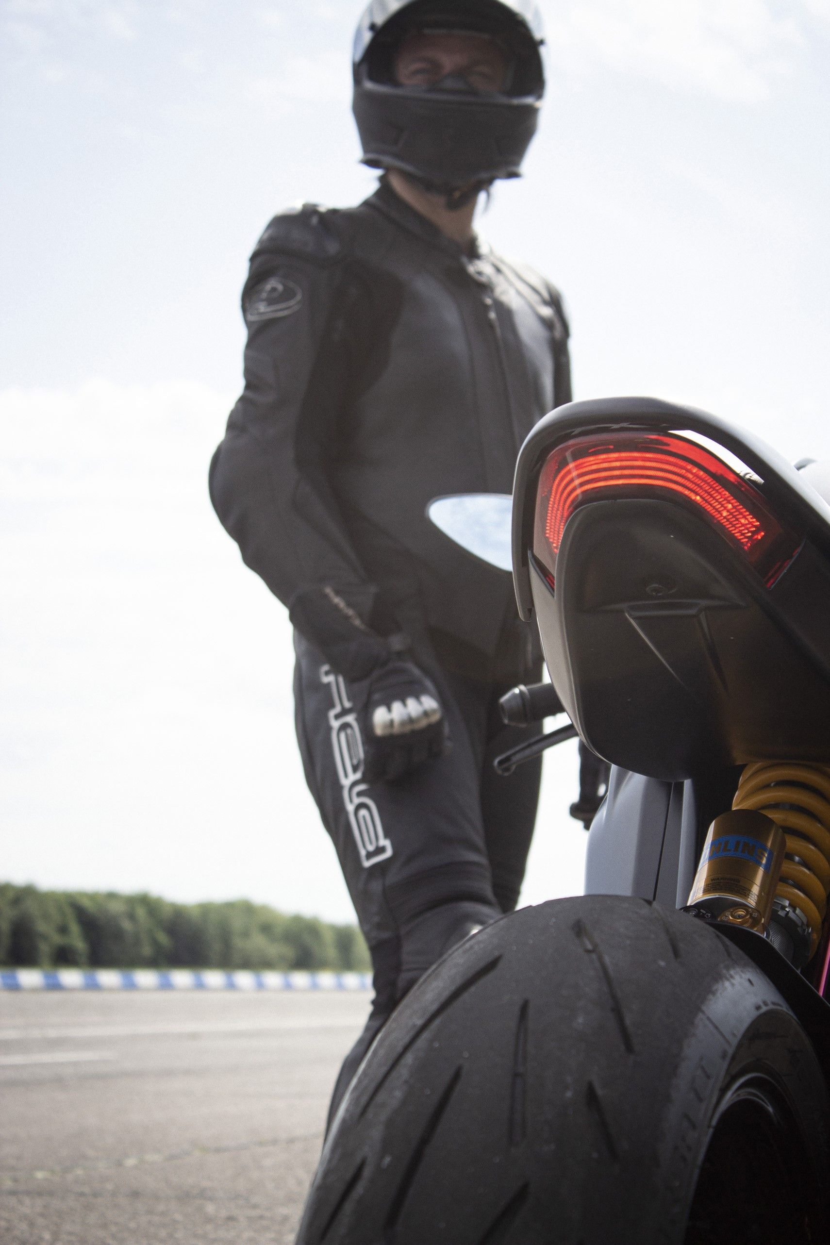  Ex-MotoGP Rider James Ellison posing with Arc Vector