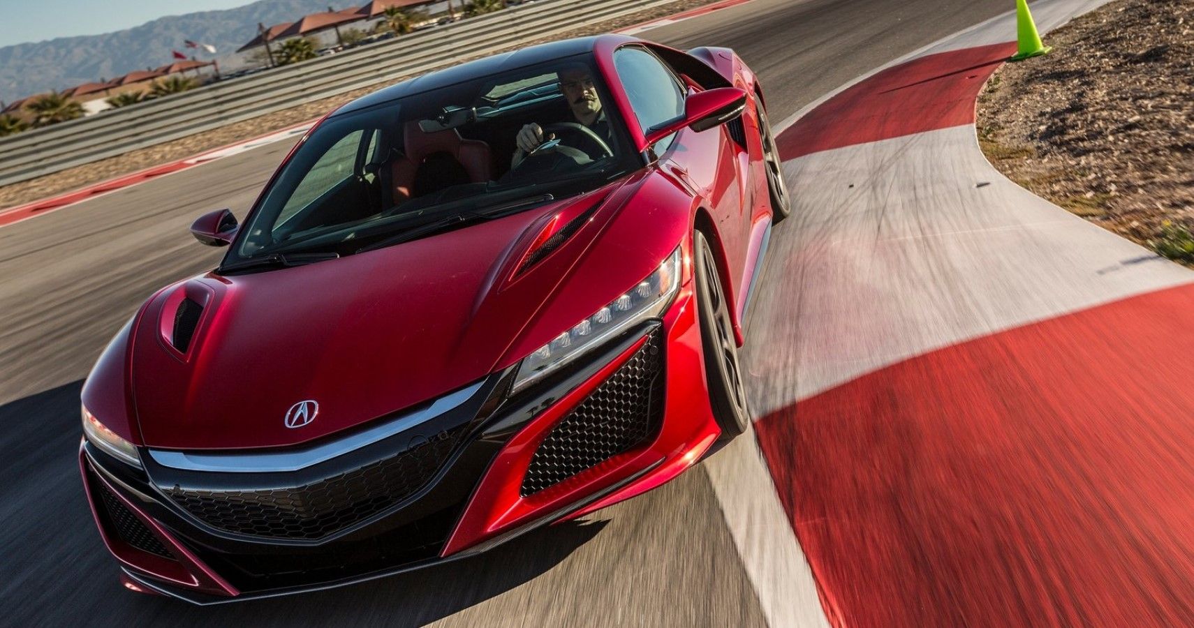 2017 Acura NSX cinematic front view on racetrack