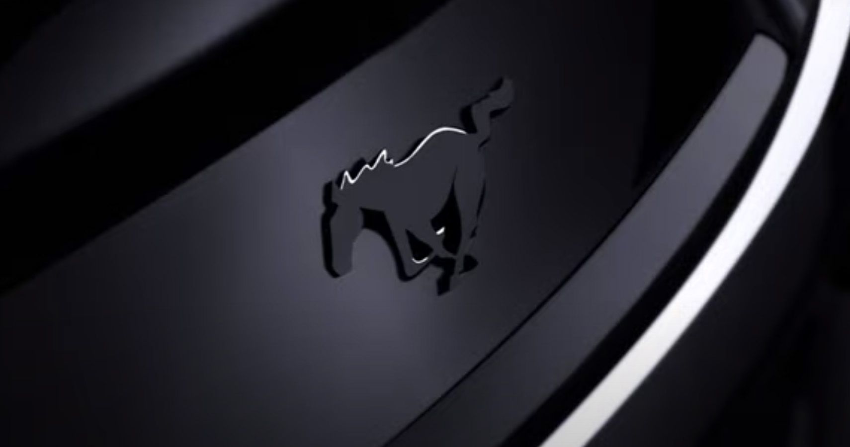 Ford Mustang logo on front of car