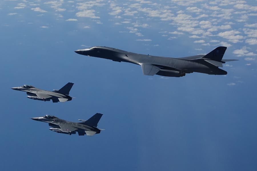 Rockwell B-1B Lancer With Two F-16 Escorts