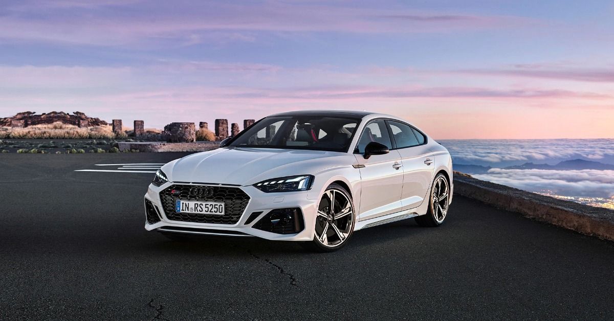 The 2022 Audi RS5 Sportback parked off-road. 