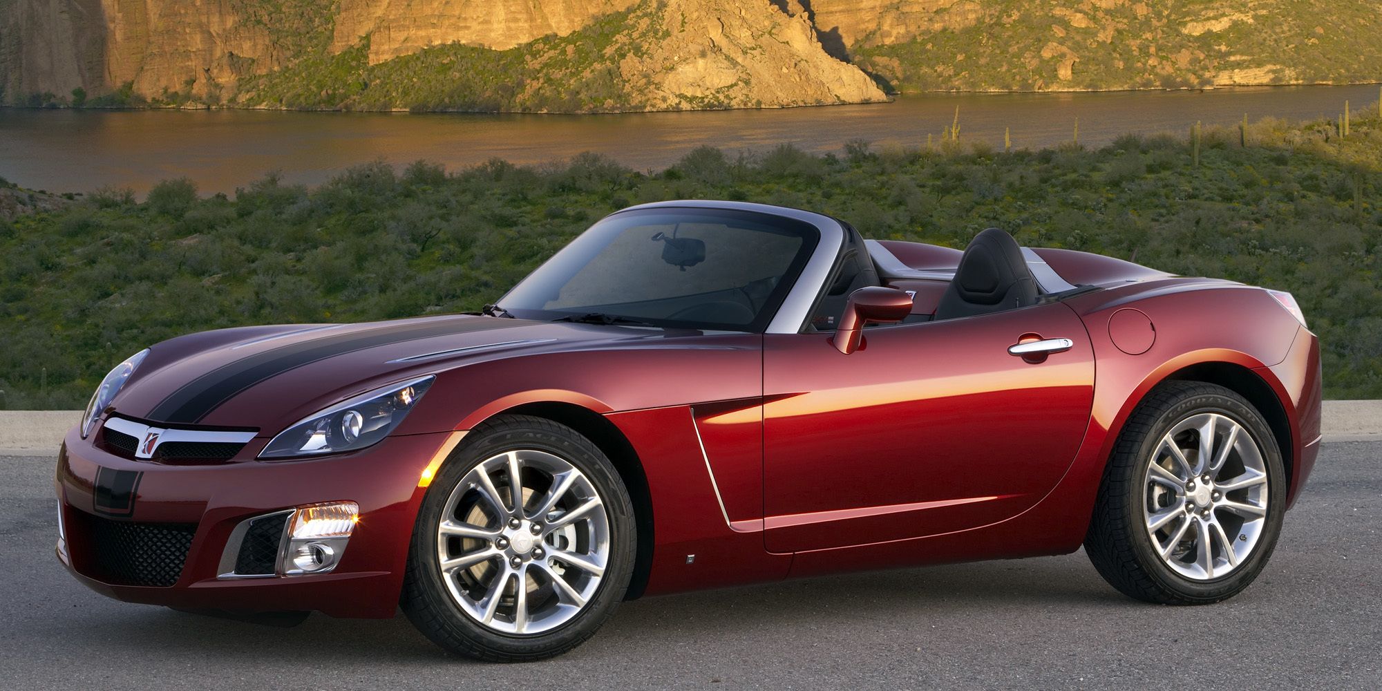 Front 3/4 view of a red Saturn Sky Red Line