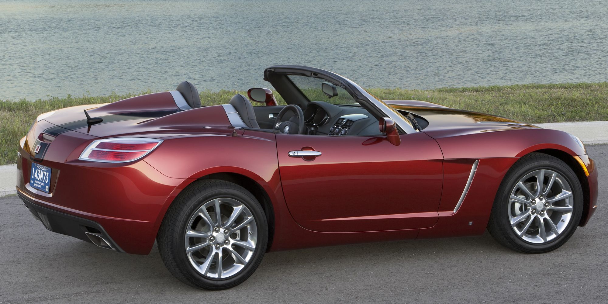 Rear 3/4 view of a red Saturn Sky Red Line