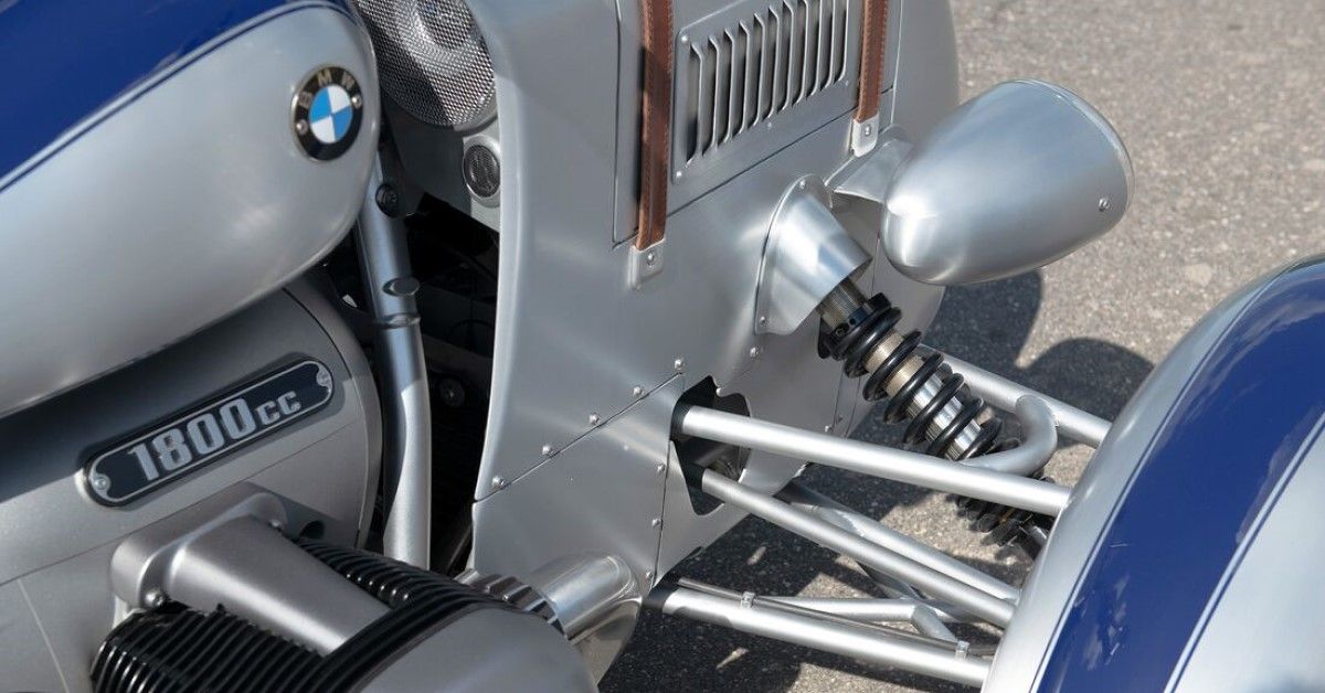 Three-wheeled BMW R 18 custom motorcycle front suspension close-up view