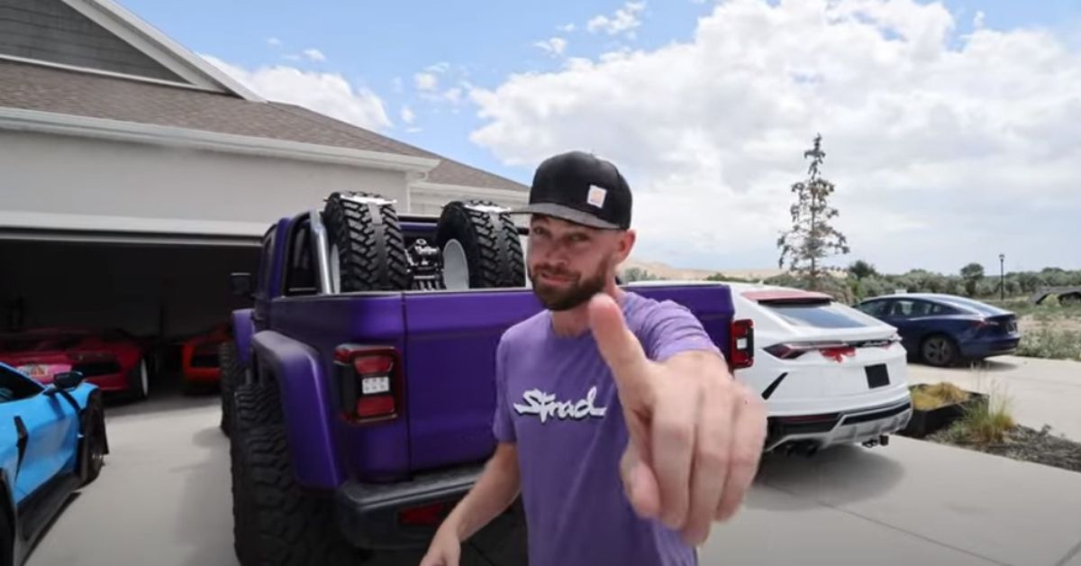 TheStradman  YouTube Channel Stradman pointing with Jeep 6x6 behind him