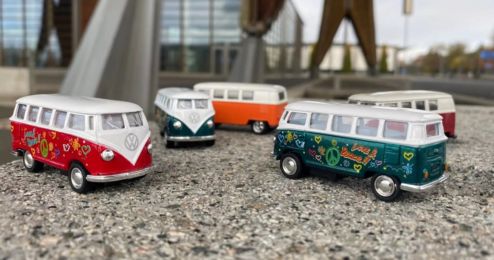 Volkswagen camper toys, scattered on table in building