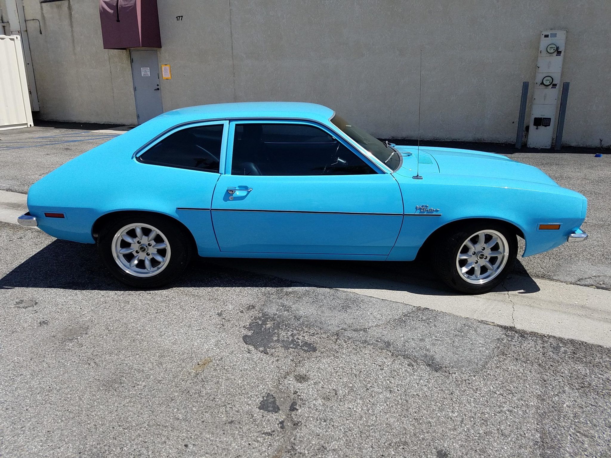 a blue 1972 Ford Pinto 5-Speed parked