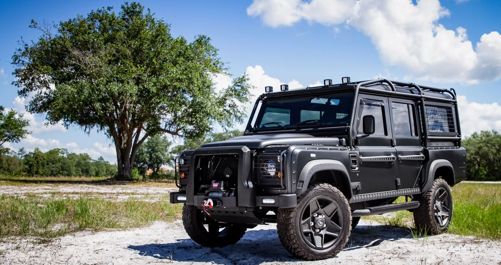 Front three quarter view of Custom Land Rover Defender 110 by ECD Automotive Design